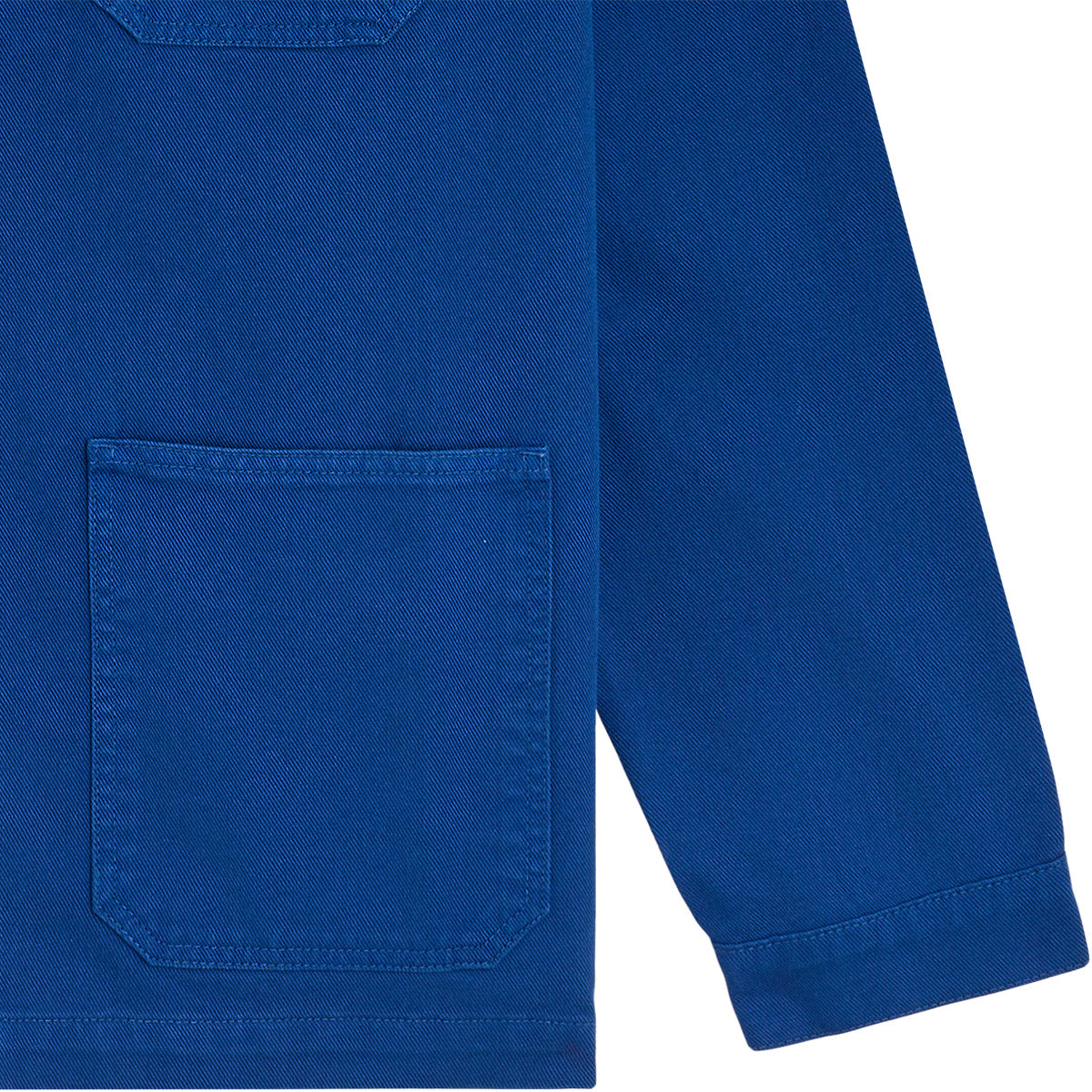 detail coutures manche et poche plaquee