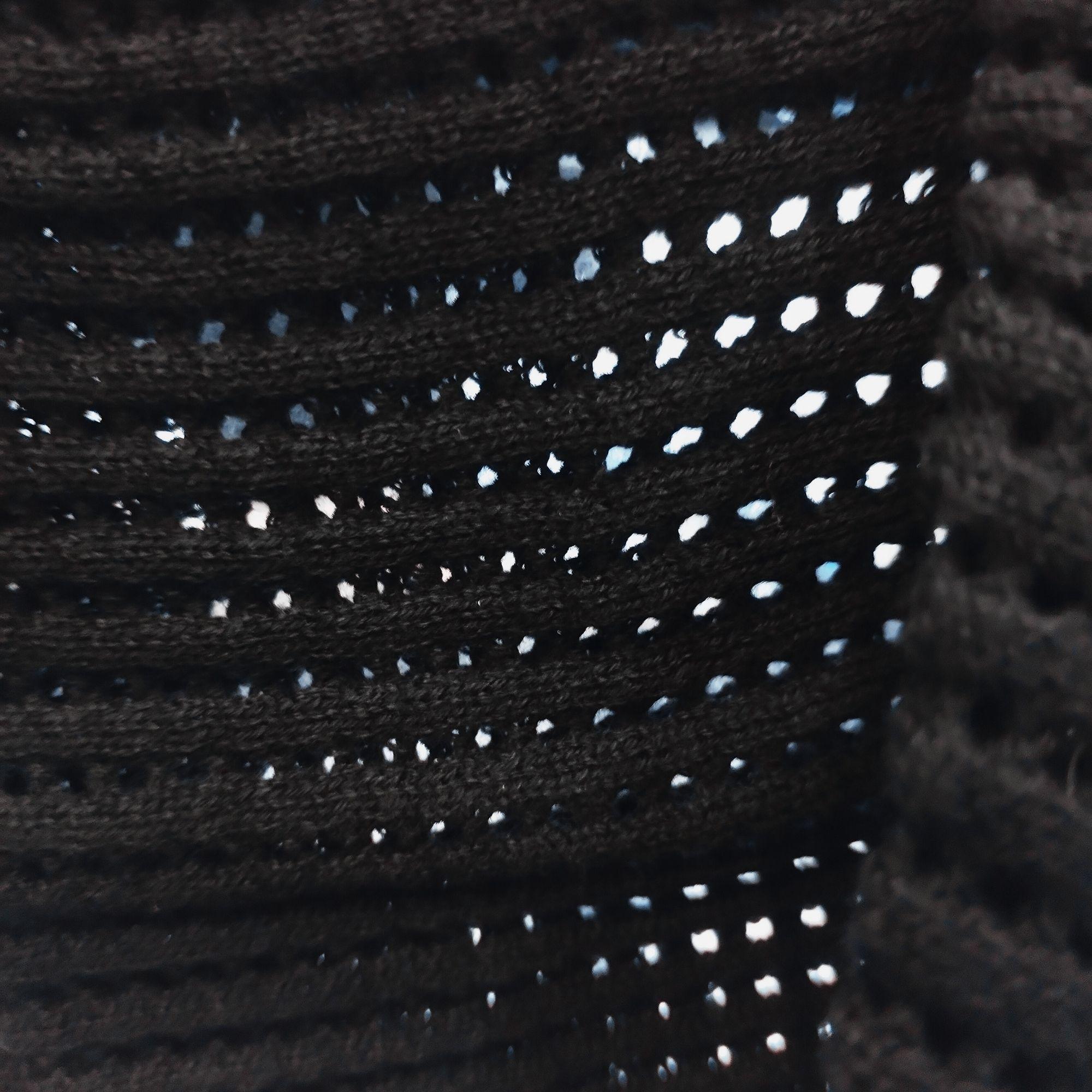 détail transparence maille ajourée