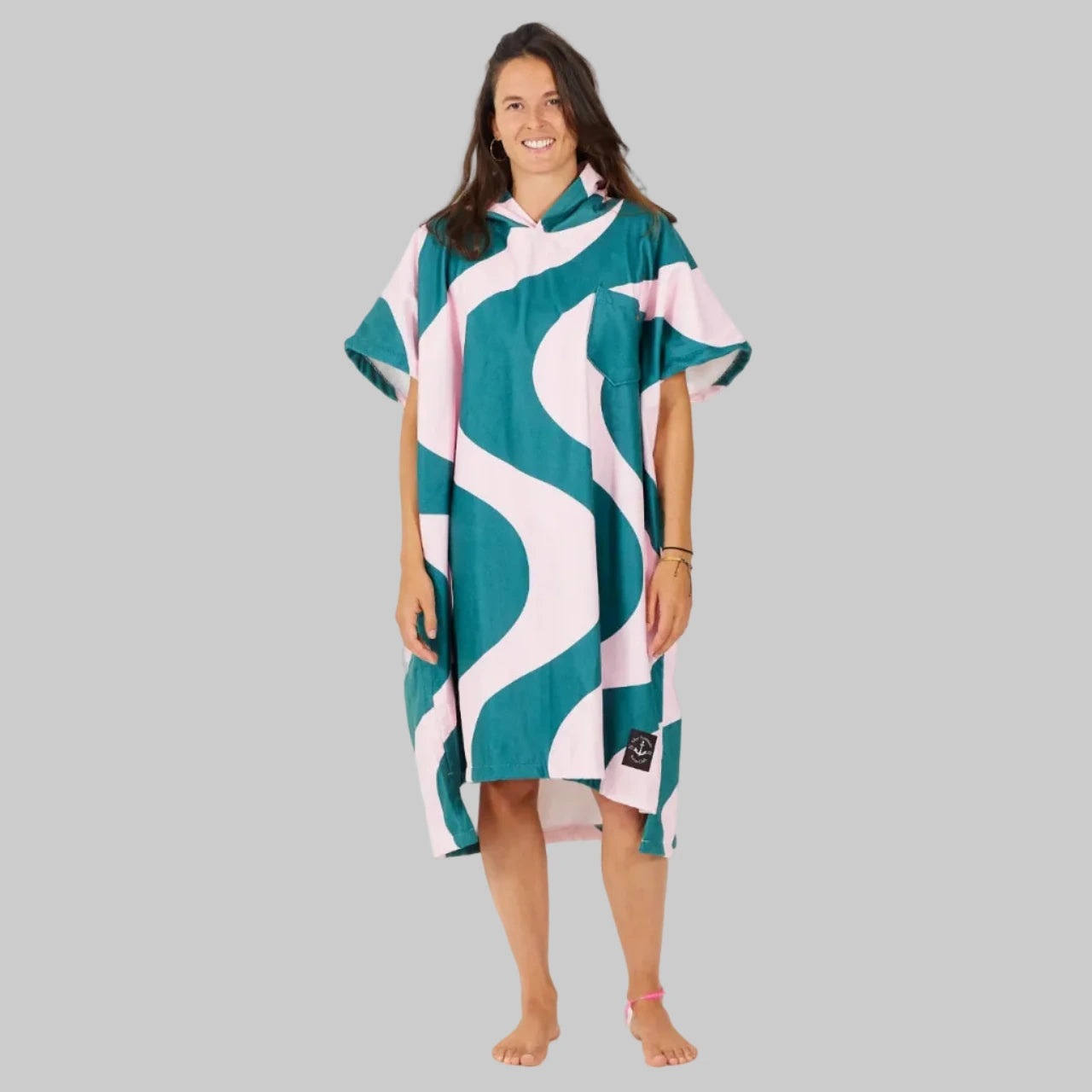 poncho de surf vert et rose unisexe vue de face