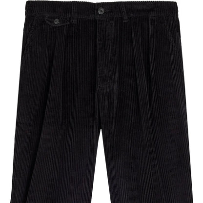 Détail de la taille, des passants de ceinture et des plis avant du pantalon large Bask in the Sun Izaro
