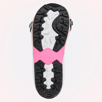Dessous de la boot Burton, semelle noire crantée avec zones blanches et large élément rose au centre