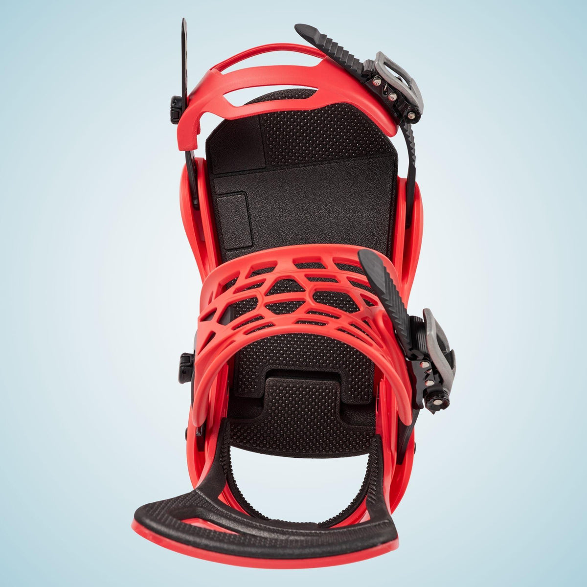 Vue plongeante sur la Freestyle Re:Flex rouge, montrant les deux straps noirs et rouges à l’intérieur de la fixation