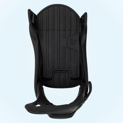 Fixation snowboard vue du dessus, avec amorti Re:Flex FullBED noir et espace central destiné à recevoir la boots