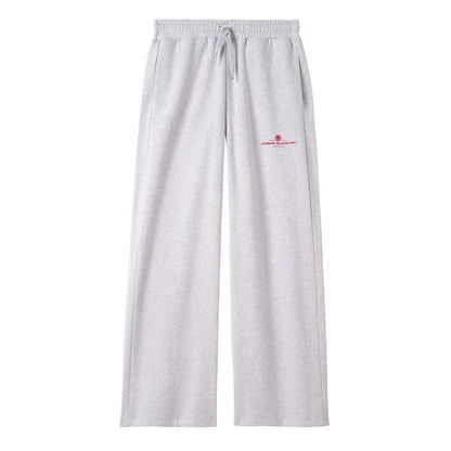 Face du bas en molleton gris clair sur fond blanc, jambe large et petit poulpe rose discret près de la poche