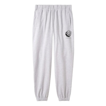 Pantalon molletonné Dude 3D présenté de face, taille élastiquée, chevilles resserrées et emblème poulpe contrasté