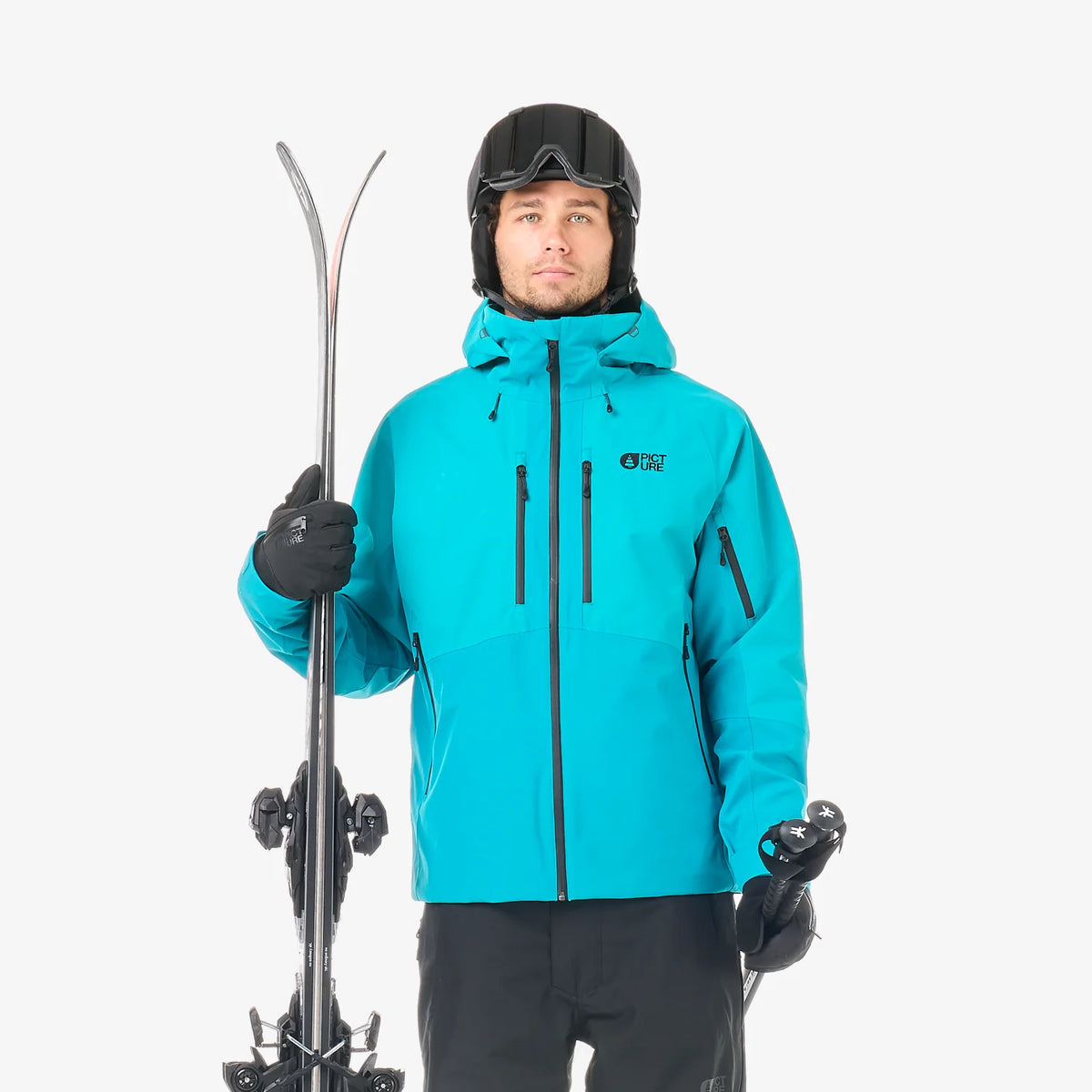 Veste de ski Picture Goods JKT Capri Breeze portée avec skis et bâtons, aperçu de la tenue complète homme