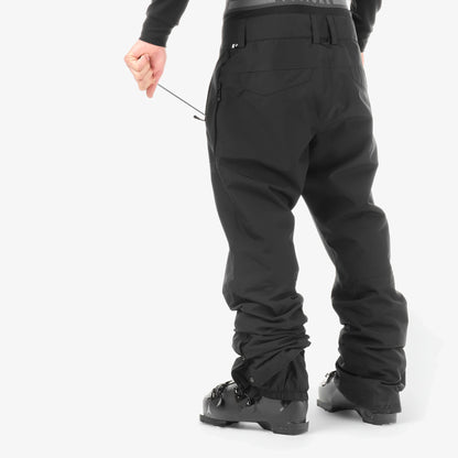 Pantalon de ski homme Picture Object Black porté de trois-quarts, coupe droite et bas de jambe ajusté sur les boots