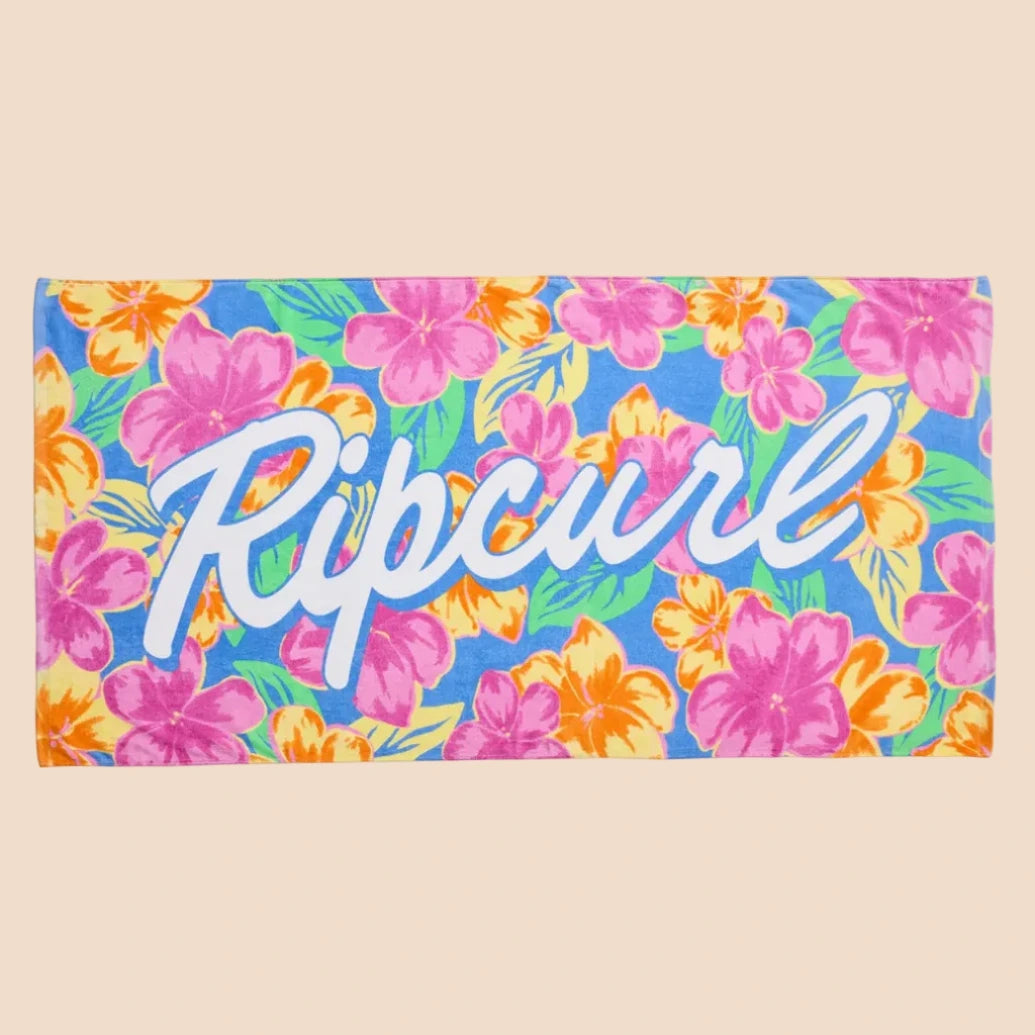 serviette plage rip curl avec grosses fleurs multicolores