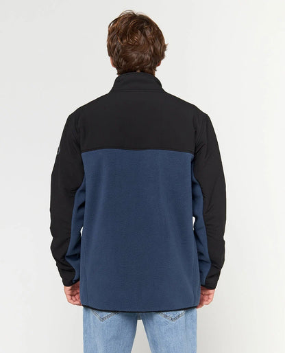 Au dos, la polaire Anti Series Search associe un panneau supérieur noir à un corps bleu marine uni