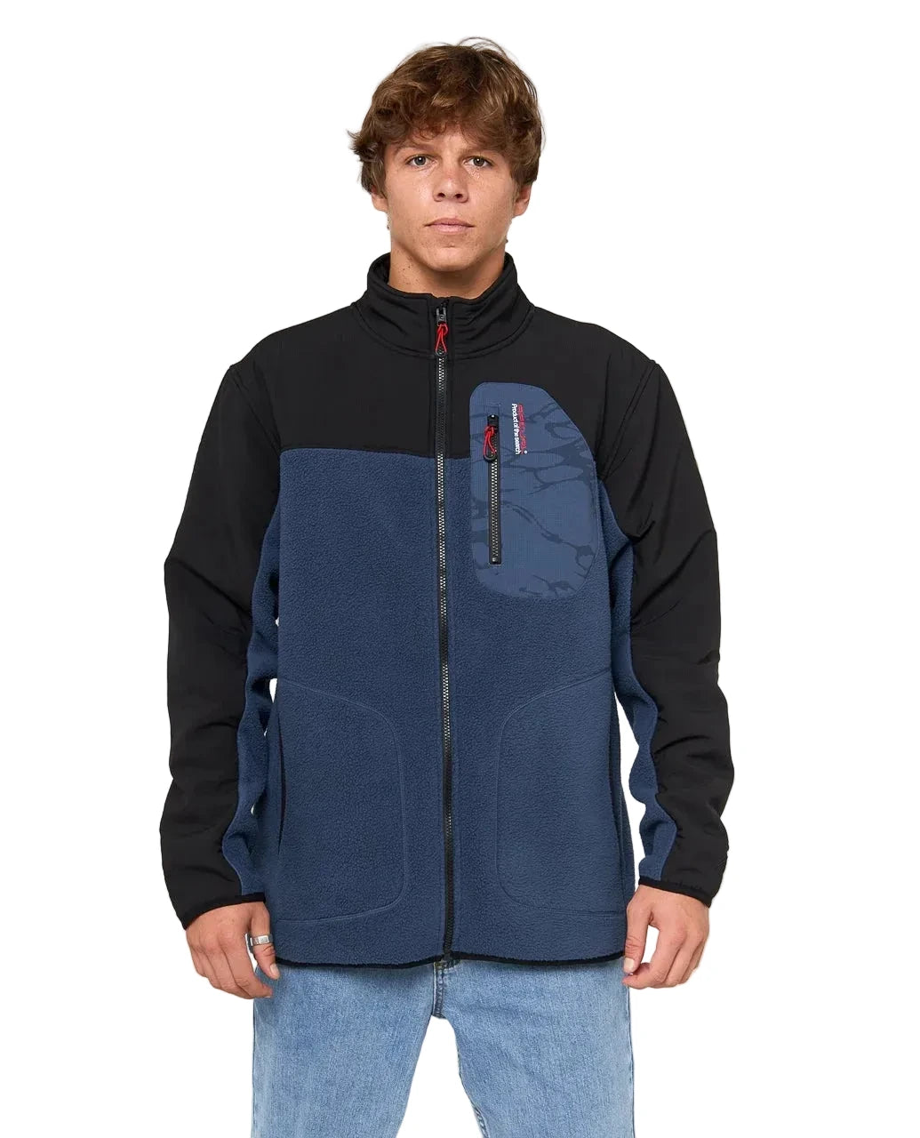 Polaire surfwear Rip Curl Anti Series Search portée de face, construction zippée bleu marine et noir avec poche poitrine