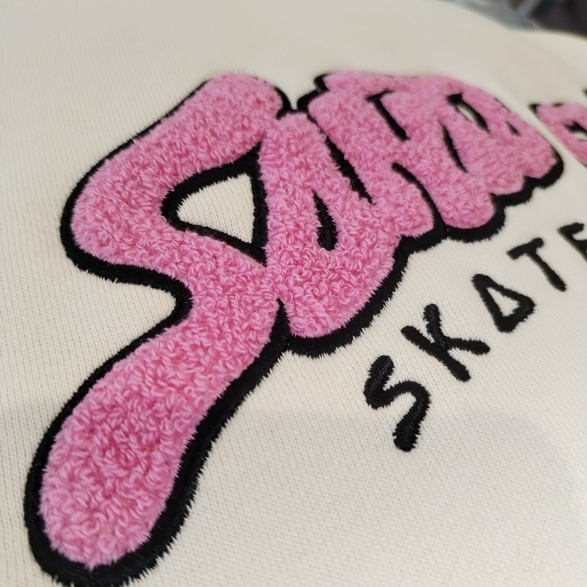 detail matiere logo rose