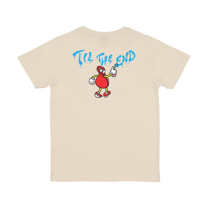 Dos du tee-shirt skate beige clair, avec lettrage bleu en arc et petit personnage rouge et noir dans le haut du dos faisant un tag