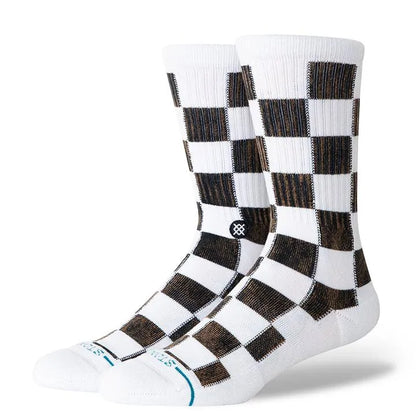 chaussettes stance a damier noir et blanc unisexe vue de face