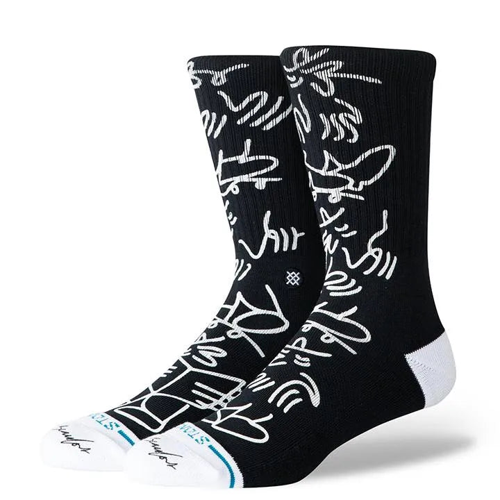 chaussettes stance noires a motifs blancs collaboration avec lucas beaufort unisexe vue de profil