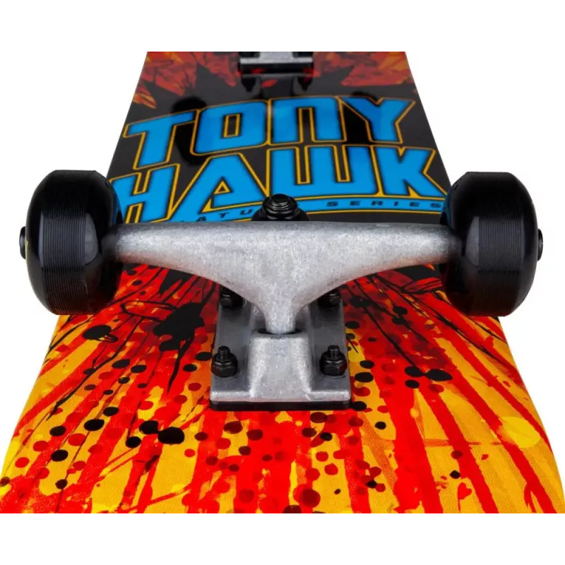Zoom sur truck, roues noires et logo Tony Hawk du skateboard complet Shatter Logo