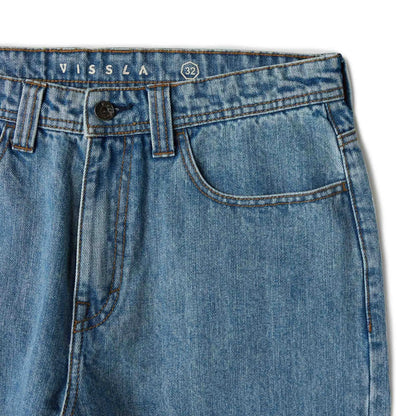 jean large homme bleu détail coutures et poches avant