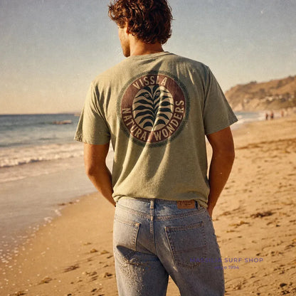 homme portant tee shirt vert natural wonders vissla lifestyle vue de dos